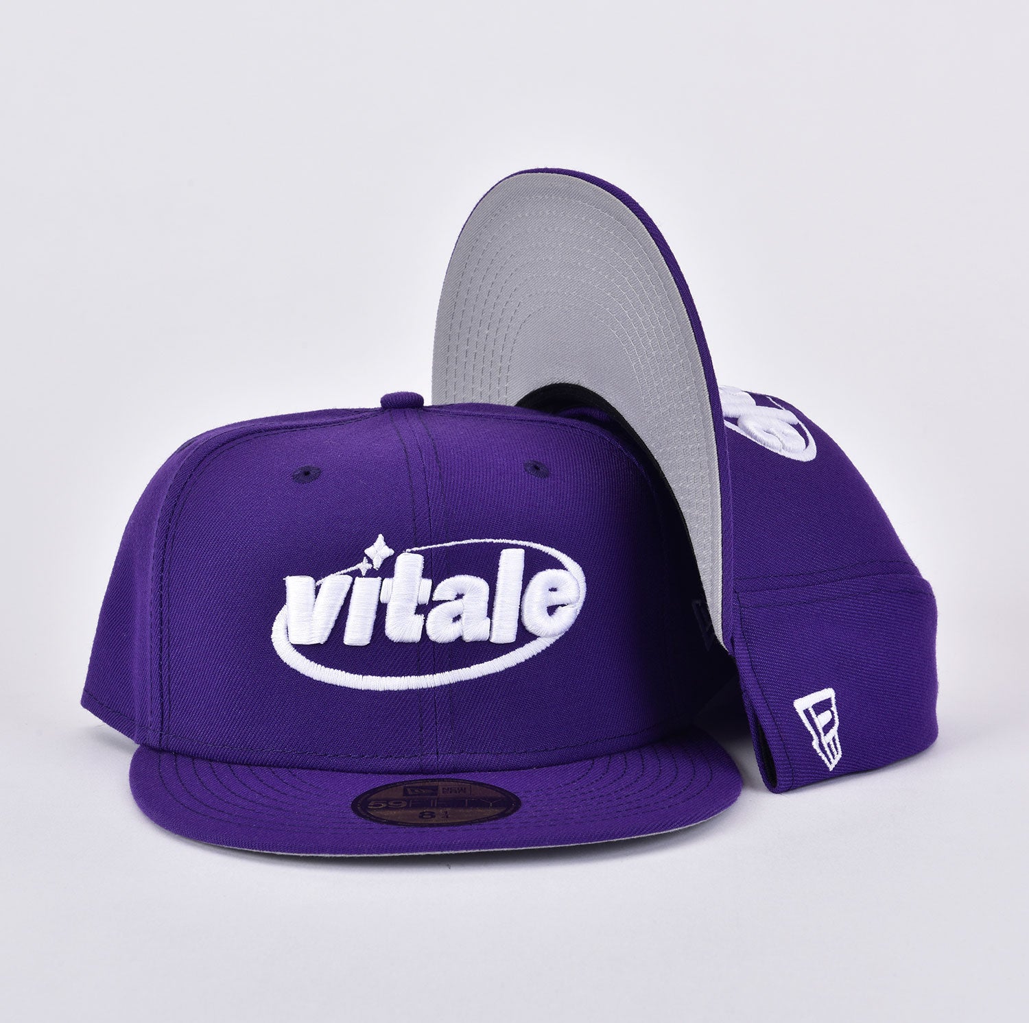 purple fitted hat